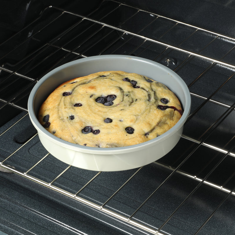Sur la Table Kitchen Essentials Bake Sale 9" Carbon Steel Cake Pan - Eggshell - Grey Nonstick Interior - Color Label - Round