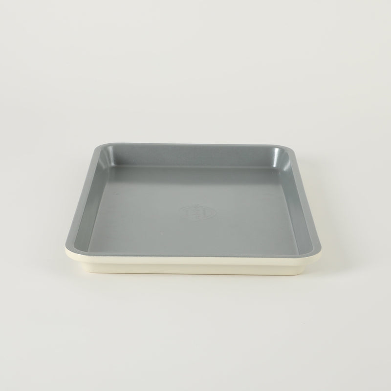 Sur la Table Kitchen Essentials Bake Sale 13" Carbon Steel Cookie Sheet - Eggshell - Grey Nonstick Interior - Color Label
