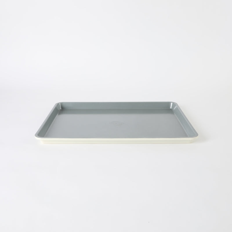 Sur la Table Kitchen Essentials Bake Sale 18" Carbon Steel Cookie Sheet - Eggshell - Grey Nonstick Interior - Color Label