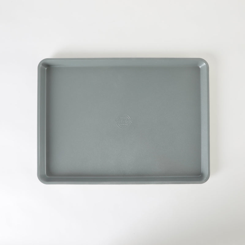 Sur la Table Kitchen Essentials Bake Sale 18" Carbon Steel Cookie Sheet - Eggshell - Grey Nonstick Interior - Color Label